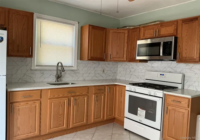 Photo 3 of Sale Pending at 11824 236th Street, New York, NY 11411 | MLS# 1037272 | Listing updated on 2026-09-19