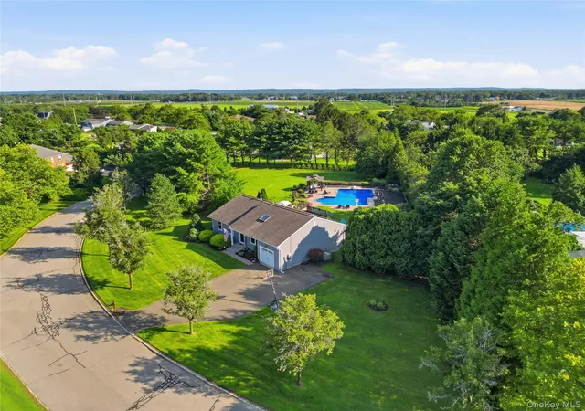 Photo 1 of Single family home for sale at 71 Triangle Ln, Riverhead, NY 11933 | MLS# 1037404 | Listing updated on 2026-09-18