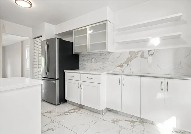 Photo 3 of Sale Pending at 8 Manors Dr, Oyster Bay, NY 11753 | MLS# 1037552 | Listing updated on 2026-09-03