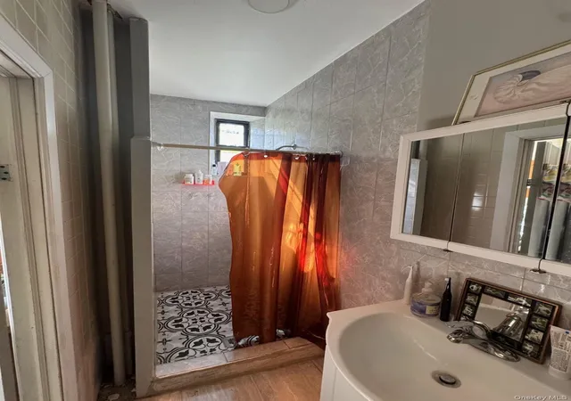 Photo 2 of Multi family home for sale at 1728 Greene Ave, New York, NY 11385 | MLS# 1037669 | Listing updated on 2026-08-23