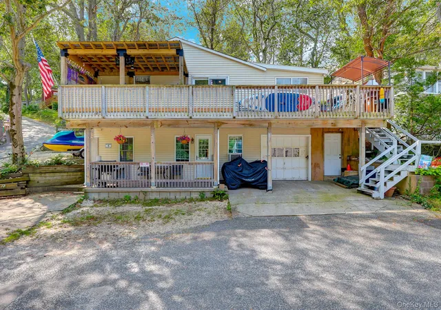 Photo 1 of Multi family home for sale at 5 Woodcliff Trl, Riverhead, NY 11933 | MLS# 1037783 | Listing updated on 2026-09-17