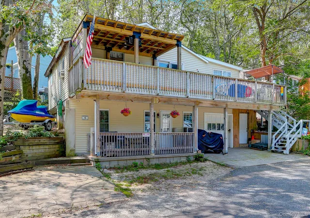 Photo 2 of Multi family home for sale at 5 Woodcliff Trl, Riverhead, NY 11933 | MLS# 1037783 | Listing updated on 2026-09-17