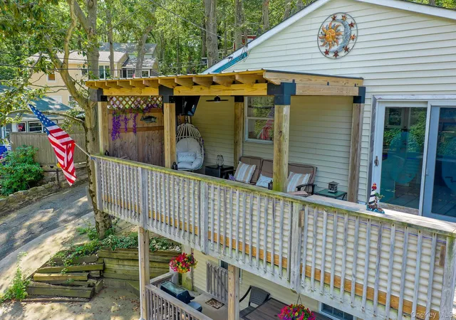 Photo 3 of Multi family home for sale at 5 Woodcliff Trl, Riverhead, NY 11933 | MLS# 1037783 | Listing updated on 2026-09-17