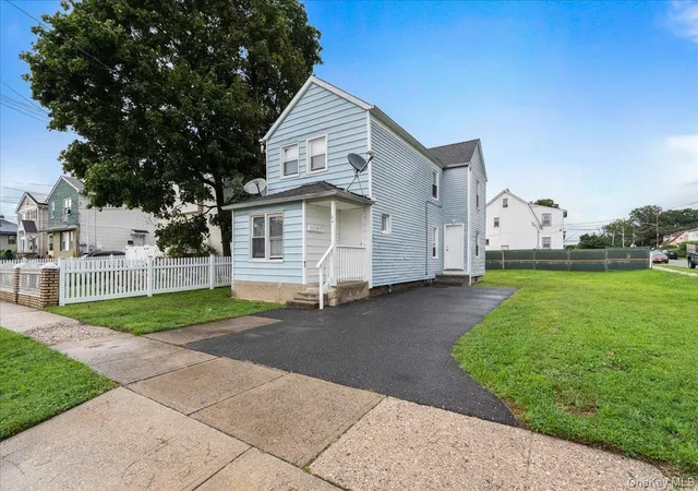 Photo 2 of Multi family home for sale at 64 Stewart Ave, Hempstead, NY 11550 | MLS# 1038065 | Listing updated on 2026-09-08