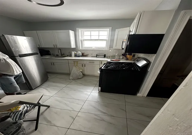 Photo 3 of Single family home for sale at 9970 211th Street, New York, NY 11429 | MLS# 1038135 | Listing updated on 2026-08-27