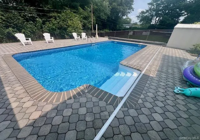 Photo 3 of Sale Pending at 7 Cedar Ave, Brookhaven, NY 11727 | MLS# 1038353 | Listing updated on 2026-09-16
