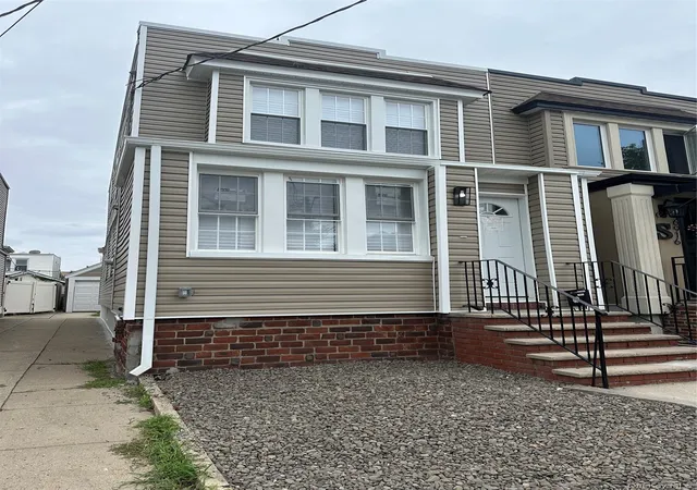 Photo 2 of Single family home for sale at 6918 69th Street, New York, NY 11385 | MLS# 1038841 | Listing updated on 2026-08-29