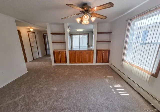 Photo 3 of Condo for sale at 162 Village Cir W, Brookhaven, NY 11949 | MLS# 1039145 | Listing updated on 2026-09-05