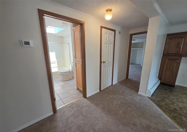 Listing Photo 5 - Condo for sale in building located at 162 Vlg Cir W, Brookhaven, NY 11949