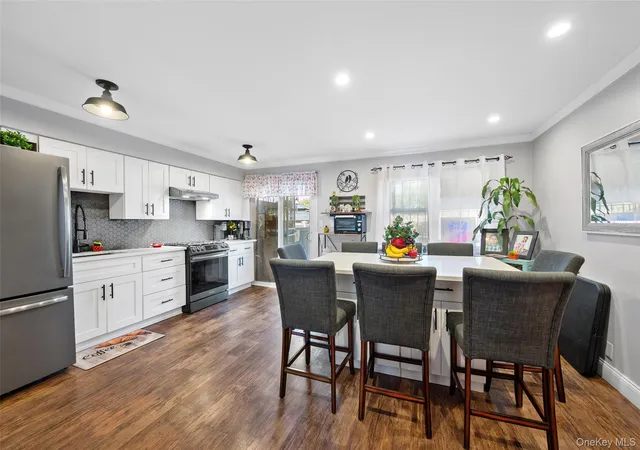 Photo 1 of Sale Pending at 6991 Caldwell Ave, New York, NY 11378 | MLS# 1039184 | Listing updated on 2026-09-18