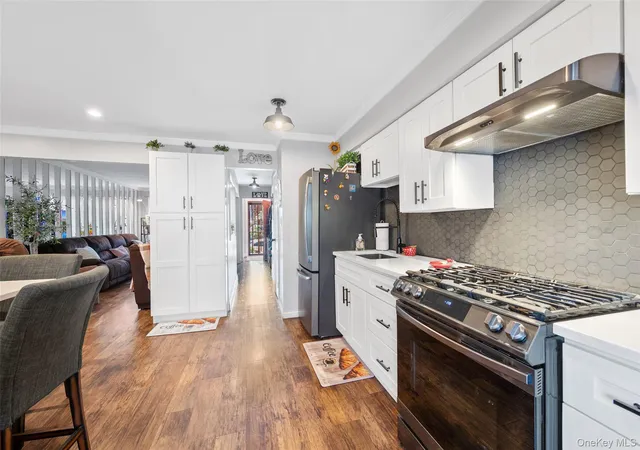 Photo 2 of Sale Pending at 6991 Caldwell Ave, New York, NY 11378 | MLS# 1039184 | Listing updated on 2026-09-18