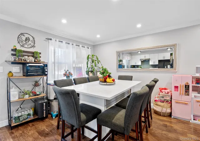 Photo 3 of Sale Pending at 6991 Caldwell Ave, New York, NY 11378 | MLS# 1039184 | Listing updated on 2026-09-18
