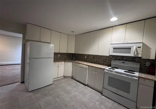 Photo 3 of Sale Pending at 143 E Parkview Dr, Brookhaven, NY 11967 | MLS# 1039208 | Listing updated on 2026-09-13