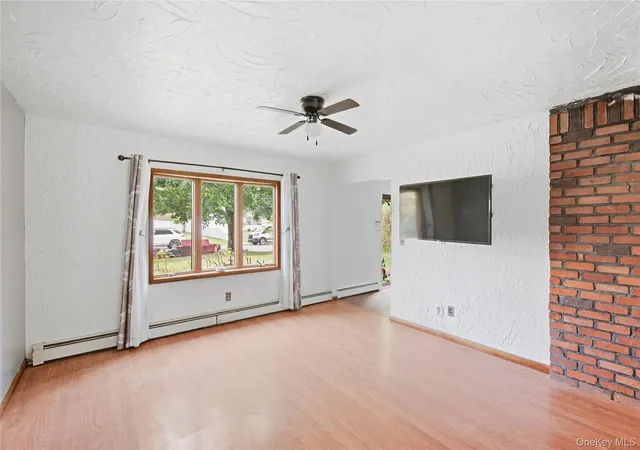 Photo 4 of Single family home for sale at 8 Imperial Dr, Brookhaven, NY 11764 | MLS# 1039291 | Listing updated on 2026-10-04