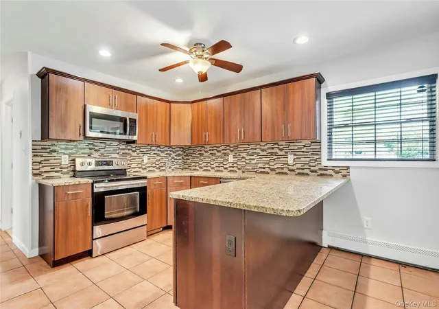 Photo 3 of Single family home for sale at 36 Atlas Ln, Oyster Bay, NY 11801 | MLS# 1039601 | Listing updated on 2026-10-04