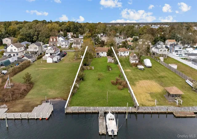 Photo 2 of Single family home for sale at 22 Shore Dr, Brookhaven, NY 11951 | MLS# 1039782 | Listing updated on 2026-10-25