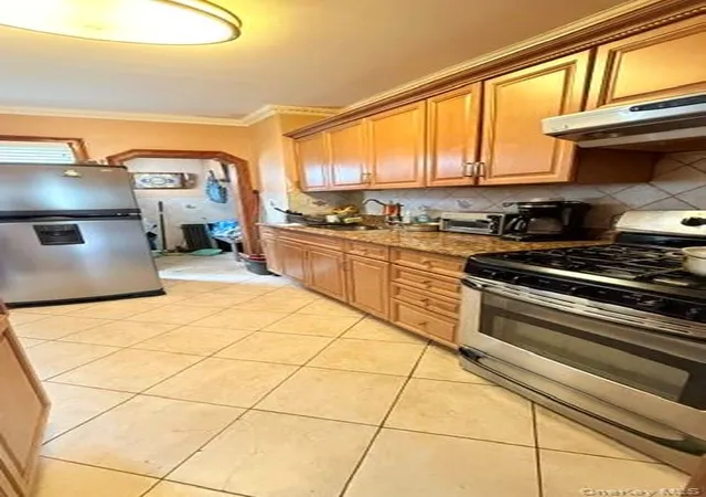 Photo 2 of Sale Pending at 77 03 95th Avenue, New York, NY 11416 | MLS# 1039806 | Listing updated on 2026-09-17