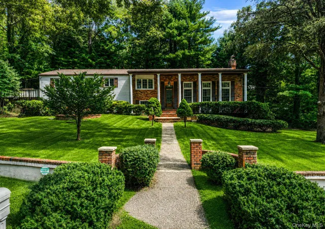 Photo 2 of Single family home for sale at 23 Colonial Dr, Smithtown, NY 11787 | MLS# 1039816 | Listing updated on 2026-10-07
