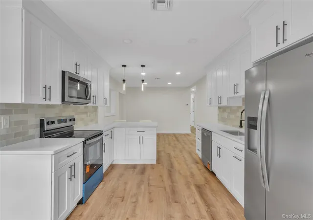 Photo 2 of Sale Pending at 5 Orleans Green, Brookhaven, NY 11727 | MLS# 1040239 | Listing updated on 2026-09-30
