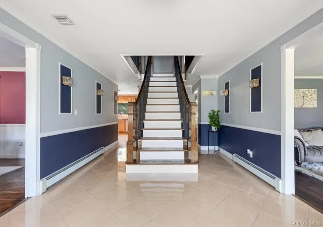 Photo 3 of Single family home for sale at 1 Whispering Ct, Huntington, NY 11746 | MLS# 1040479 | Listing updated on 2026-10-05