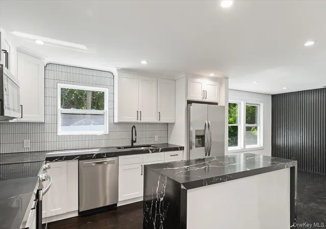 Photo 3 of Single family home for sale at 8 Elm Dr, Huntington, NY 11731 | MLS# 1040531 | Listing updated on 2026-08-20