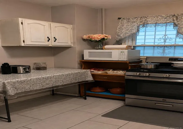 Photo 4 of Single family home for sale at 9214 168th Place, New York, NY 11433 | MLS# 1040958 | Listing updated on 2026-09-06
