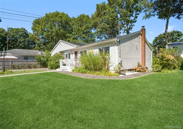Photo 2 of Single family home for sale at 15 Parkwood Dr, Brookhaven, NY 11951 | MLS# 1040965 | Listing updated on 2026-09-30