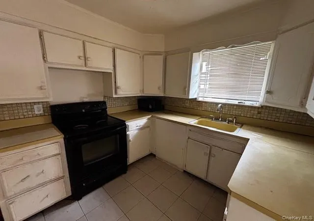 Photo 2 of Single family home for sale at 305 10th Avenue, Huntington, NY 11731 | MLS# 1041256 | Listing updated on 2026-08-22