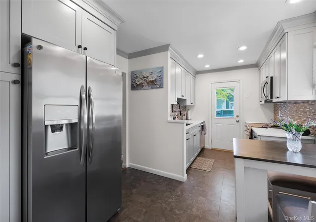 Photo 3 of Single family home for sale at 13 Westwood Dr, Babylon, NY 11703 | MLS# 1041339 | Listing updated on 2026-10-09