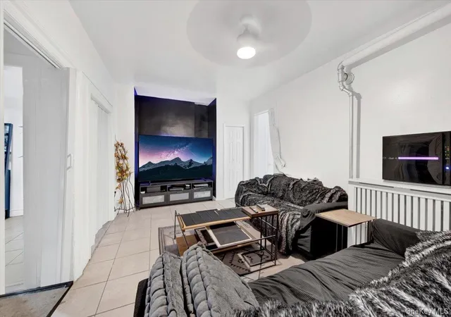 Listing Photo 1 - Condo for sale in building located at 1972 Lafontaine Ave, New York, NY 10457 - Unit #1972
