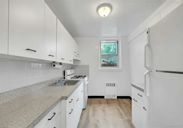 Listing Photo 1 - Condo for sale in building located at 5610 Netherland Ave, New York, NY 10471 - Unit #1G