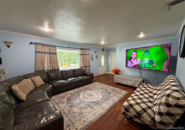 Photo 3 of Single family home for sale at 431 Blue Point Rd, Brookhaven, NY 11738 | MLS# 1042380 | Listing updated on 2026-09-02