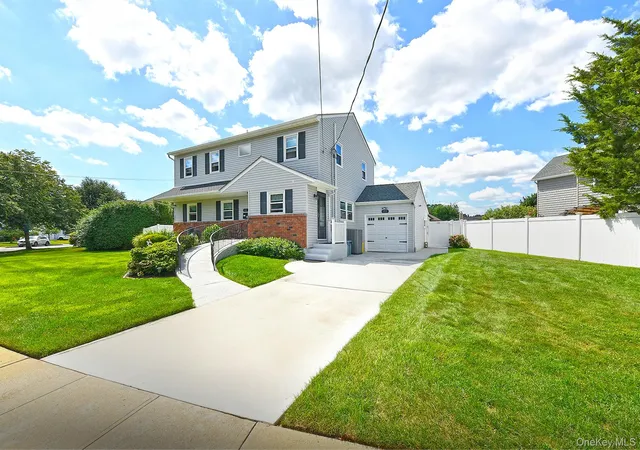 Photo 2 of Single family home for sale at 63 Michele Ter, Oyster Bay, NY 11762 | MLS# 1042463 | Listing updated on 2026-10-06