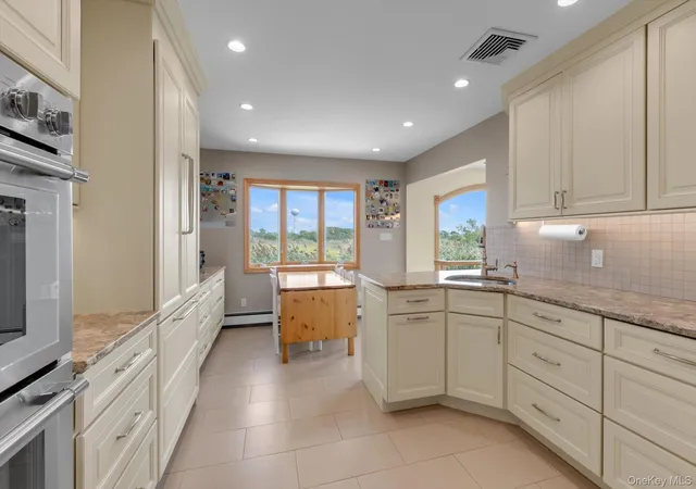 Photo 3 of Single family home for sale at 24 Donna Ln, Hempstead, NY 11561 | MLS# 1043985 | Listing updated on 2026-09-13
