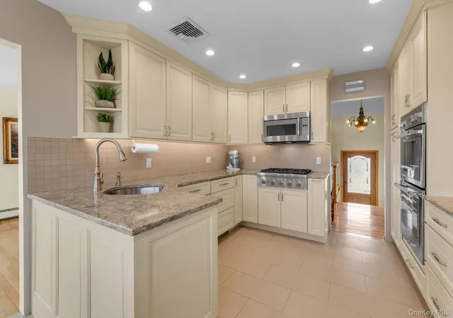 Photo 4 of Single family home for sale at 24 Donna Ln, Hempstead, NY 11561 | MLS# 1043985 | Listing updated on 2026-09-13
