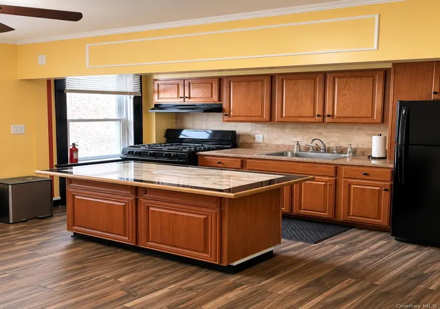 Photo 3 of Single family home for sale at 125-16 Hawtree Crk Rd, New York, NY 11420 | MLS# 1044292 | Listing updated on 2026-09-06