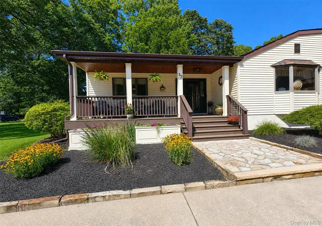 Photo 3 of Sale Pending at 57 Wellington Rd, Brookhaven, NY 11953 | MLS# 1045437 | Listing updated on 2026-09-30