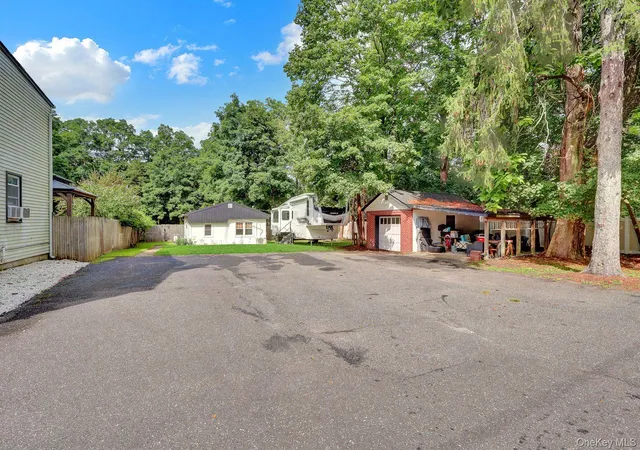 Photo 3 of Sale Pending at 7 Mooney Pond Rd, Brookhaven, NY 11727 | MLS# 1045948 | Listing updated on 2026-10-03
