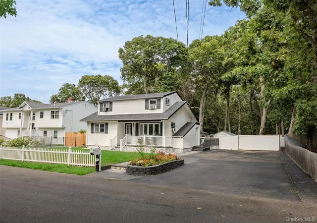 Photo 3 of Single family home for sale at 65 Carr Ln, Brookhaven, NY 11727 | MLS# 1046182 | Listing updated on 2026-09-05