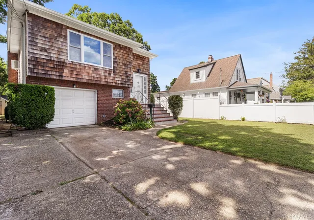 Photo 2 of Single family home for sale at 1320 Pine Acres Blvd, Islip, NY 11706 | MLS# 1046243 | Listing updated on 2026-09-03