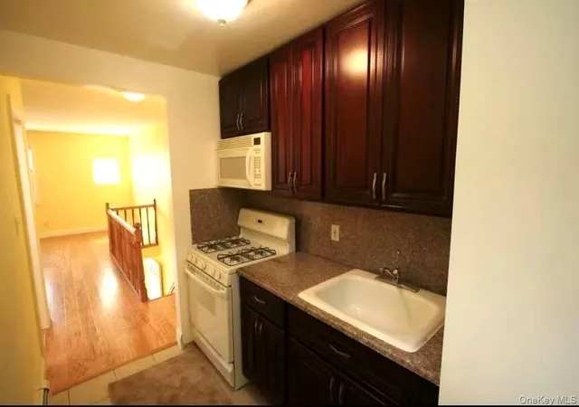 Photo 4 of House for sale at 1029 115th Street, New York, NY 11356 | MLS# 1046257 | Listing updated on 2026-09-03
