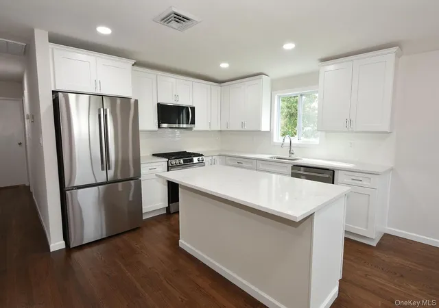 Photo 2 of Single family home for sale at 41 Bethany Dr, Huntington, NY 11725 | MLS# 1046576 | Listing updated on 2026-09-29