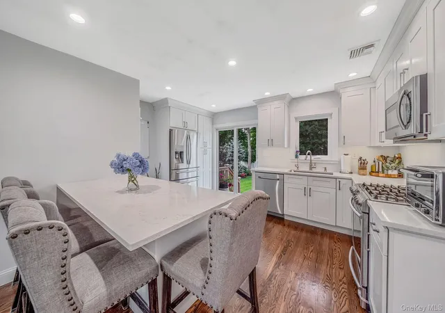 Photo 3 of Sale Pending at 8 Gedney Ave, Smithtown, NY 11787 | MLS# 1046648 | Listing updated on 2026-09-22