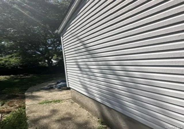 Photo 2 of Single family home for sale at 518 Jayne Blvd, Brookhaven, NY 11776 | MLS# 1046662 | Listing updated on 2026-09-04