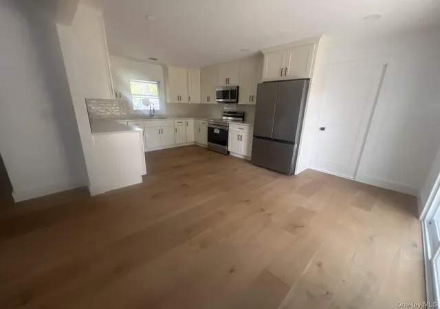 Photo 2 of Single family home for sale at 35 Winside Ln, Brookhaven, NY 11727 | MLS# 1046748 | Listing updated on 2026-09-04