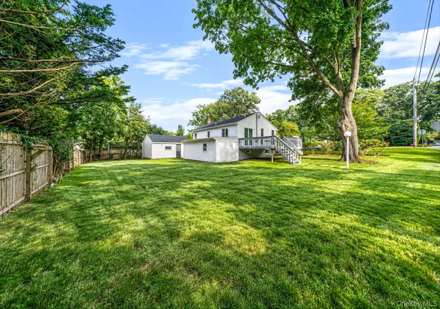 Photo 2 of Single family home for sale at 14 Millers Rd, Brookhaven, NY 11789 | MLS# 1047202 | Listing updated on 2026-09-05
