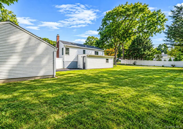 Photo 3 of Single family home for sale at 14 Millers Rd, Brookhaven, NY 11789 | MLS# 1047202 | Listing updated on 2026-09-05