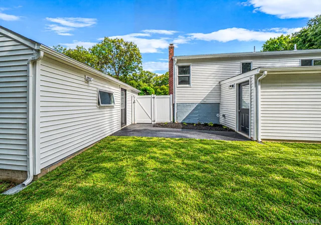 Photo 4 of Single family home for sale at 14 Millers Rd, Brookhaven, NY 11789 | MLS# 1047202 | Listing updated on 2026-09-05