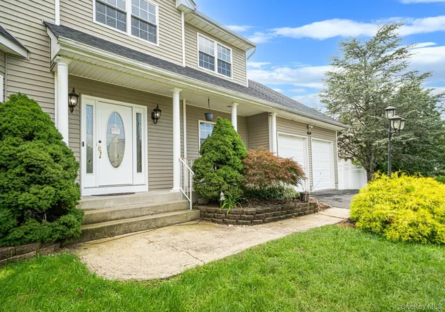 Photo 2 of Single family home for sale at 18 Woodridge Ln, Brookhaven, NY 11727 | MLS# 1047218 | Listing updated on 2026-09-05