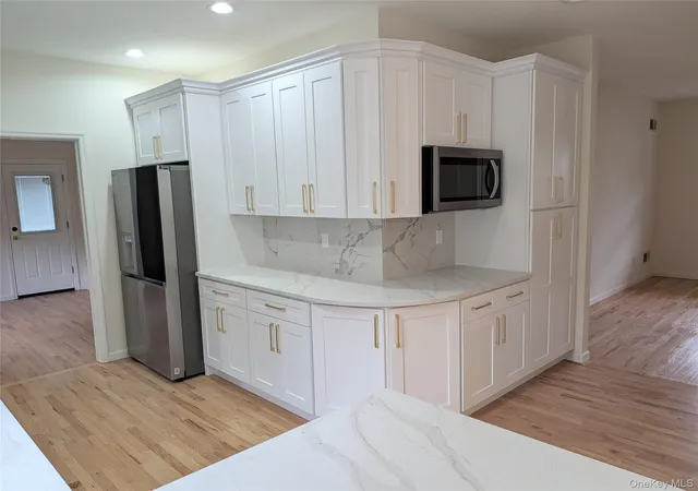 Photo 32 of Single family home for sale at 18 Woodridge Ln, Brookhaven, NY 11727 | MLS# 1047218 | Listing updated on 2026-09-05